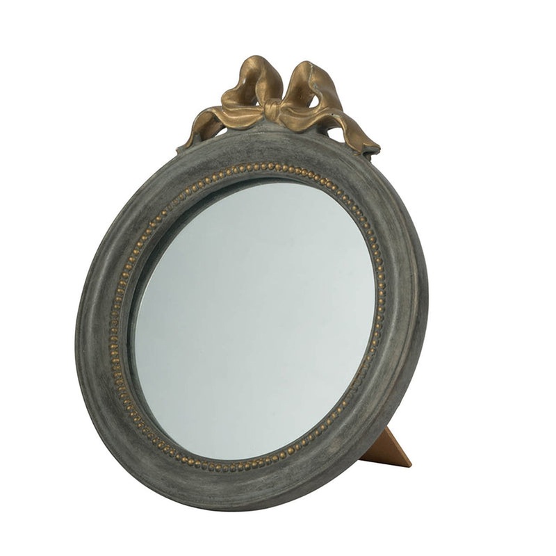 A&B Home 8" x 9" Bundle of 130 Round Slate Gray and Gold Freestanding Mirror With Bow Ornament